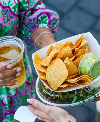 Chips and guacamole with drink