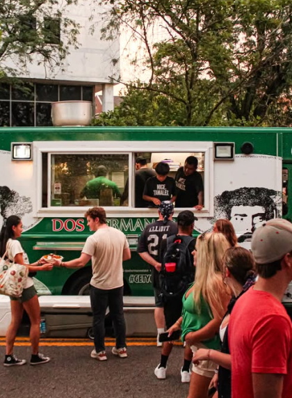 Food truck with customers at event